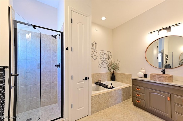 bathroom with tile patterned flooring, vanity, and plus walk in shower