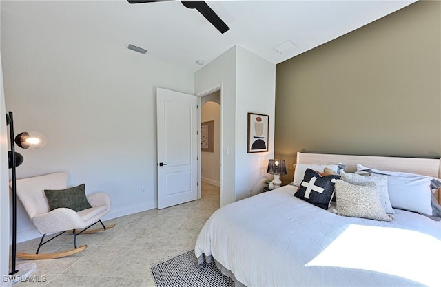 bedroom with light tile patterned floors and ceiling fan