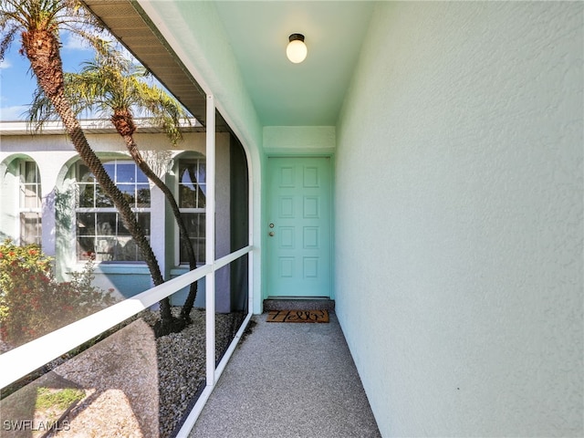 doorway to property with a balcony