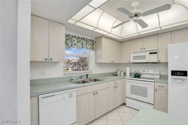 kitchen featuring sink, white appliances, light tile patterned floors, ceiling fan, and light brown cabinets