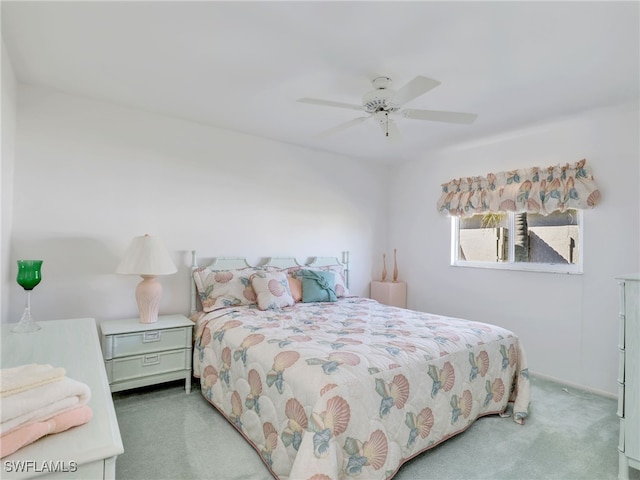 bedroom featuring ceiling fan and carpet flooring