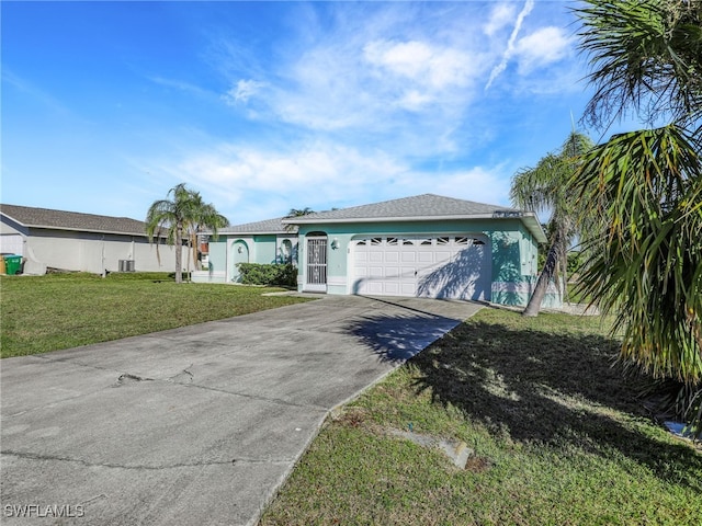 ranch-style home with a garage and a front lawn