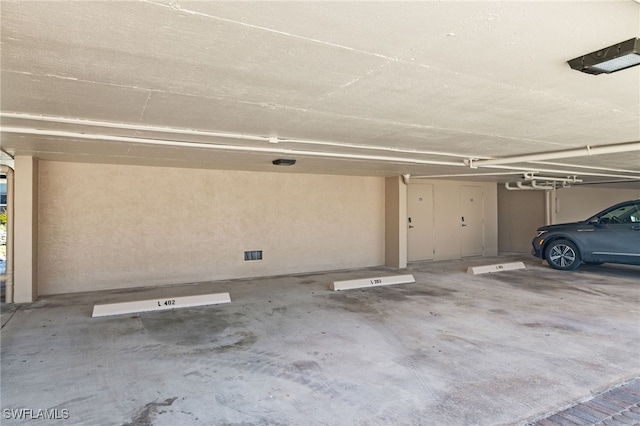 garage with a carport