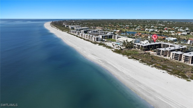 aerial view with a beach view and a water view