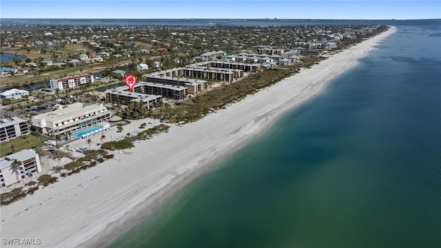 aerial view featuring a beach view and a water view