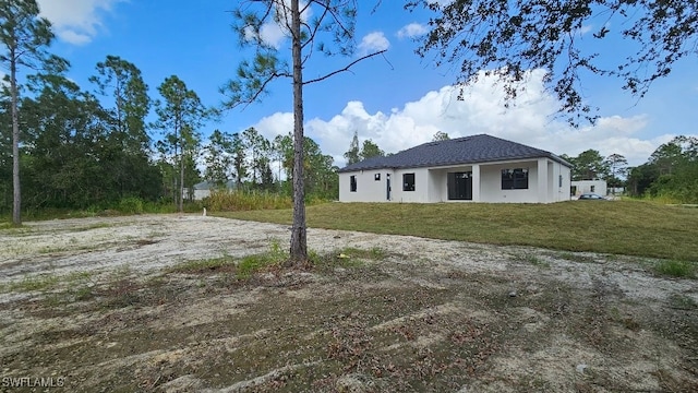 exterior space with a lawn