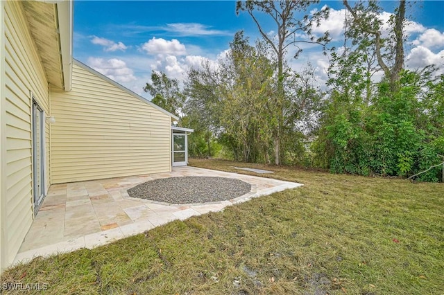 view of yard with a patio area