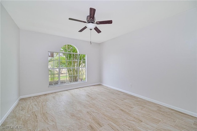 unfurnished room featuring ceiling fan