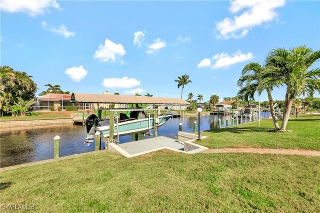 view of dock featuring a water view and a lawn