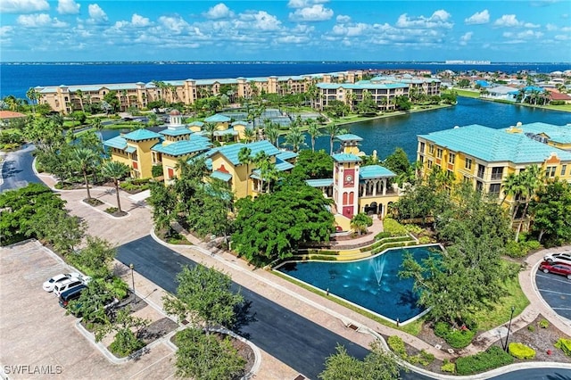 birds eye view of property featuring a water view