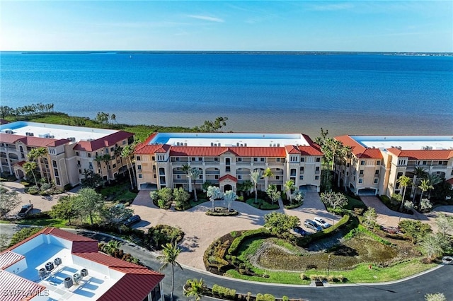 drone / aerial view featuring a water view