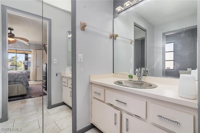 bathroom with vanity and ceiling fan