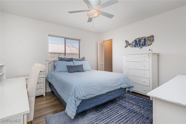 bedroom featuring dark wood-type flooring and ceiling fan