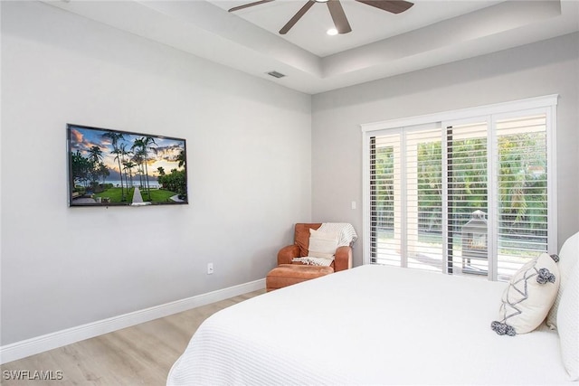 bedroom with ceiling fan and light wood-type flooring