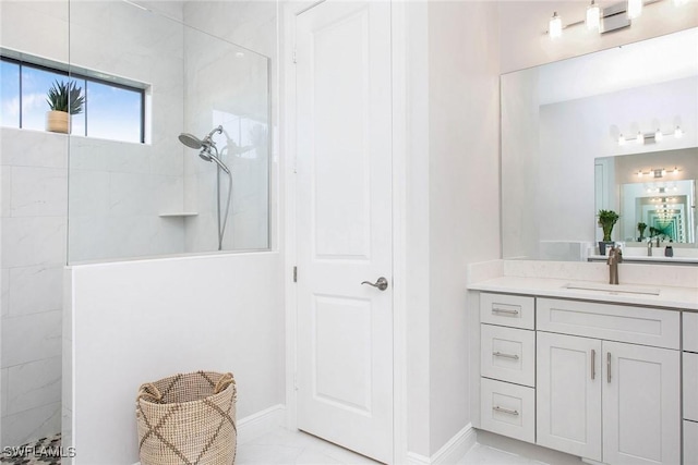 bathroom with vanity and walk in shower