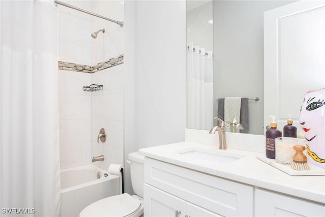 full bathroom featuring vanity, toilet, and shower / tub combo with curtain