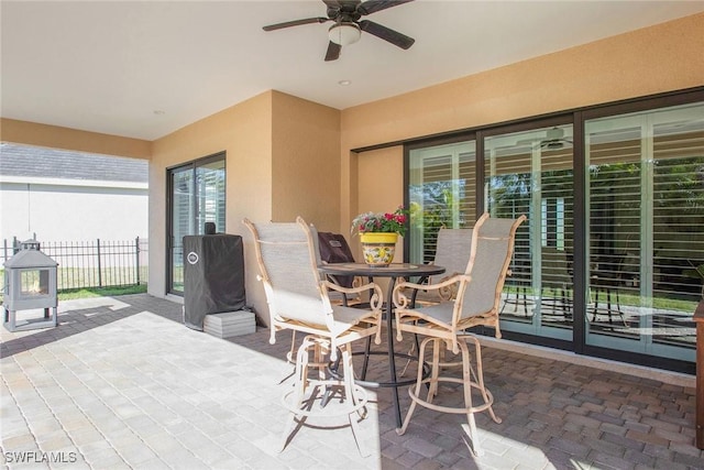 view of patio with ceiling fan