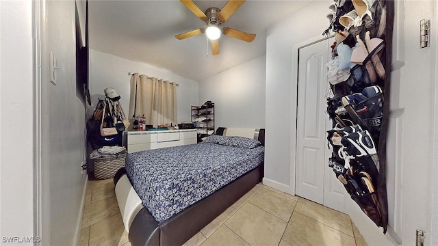 bedroom with light tile patterned floors and ceiling fan