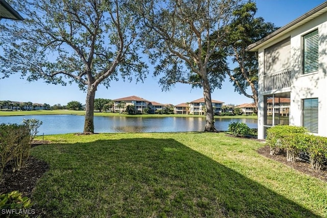 view of yard with a water view