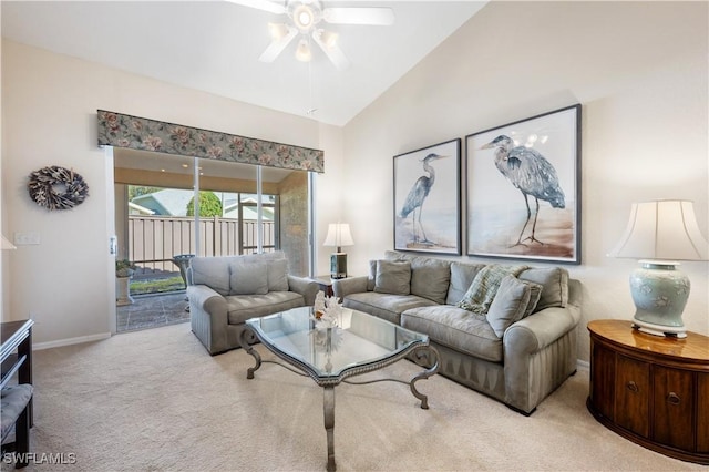 carpeted living room with lofted ceiling and ceiling fan