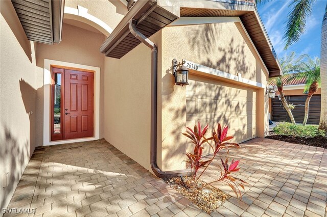 property entrance featuring a garage