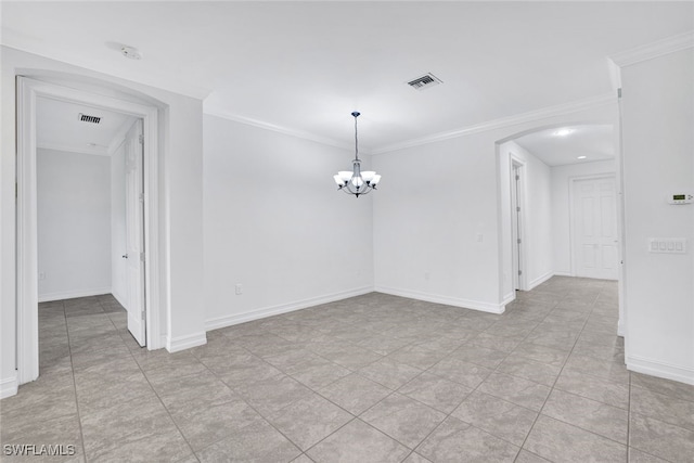 unfurnished dining area featuring crown molding and an inviting chandelier