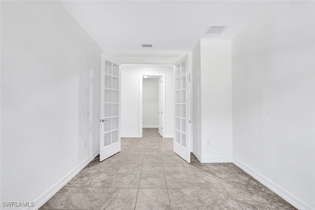 spare room with french doors