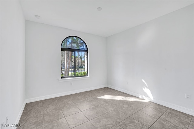 view of tiled spare room