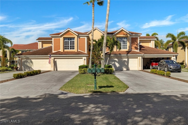 view of front of property with a garage