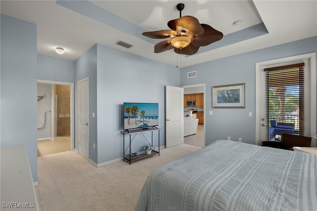 bedroom with a raised ceiling, access to outside, and ceiling fan