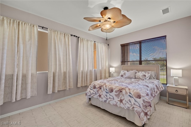 bedroom featuring ceiling fan