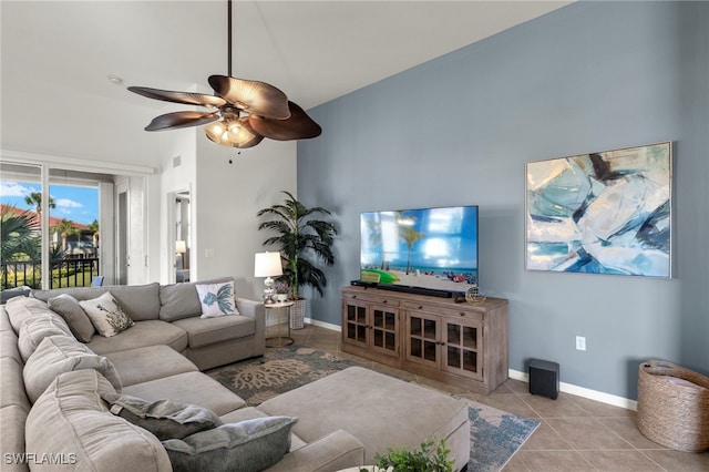 tiled living room featuring ceiling fan