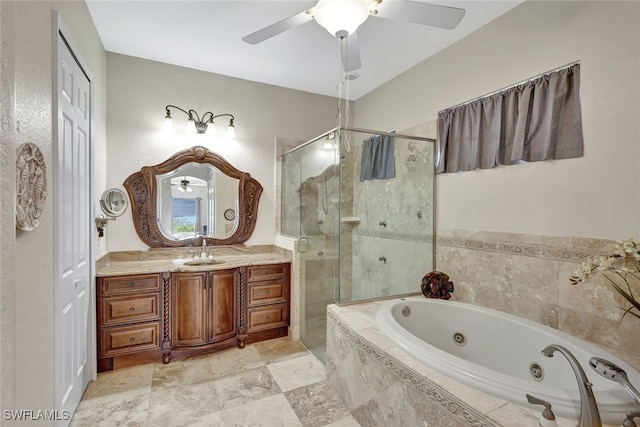 bathroom featuring vanity, ceiling fan, and separate shower and tub