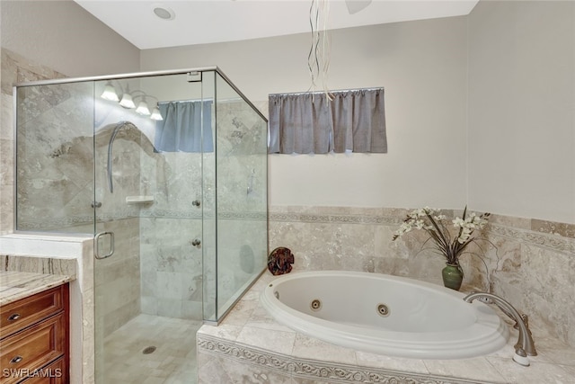 bathroom featuring vanity and plus walk in shower