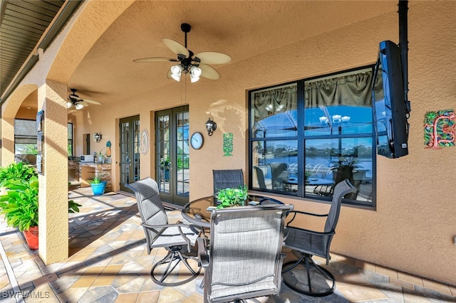 view of patio with ceiling fan