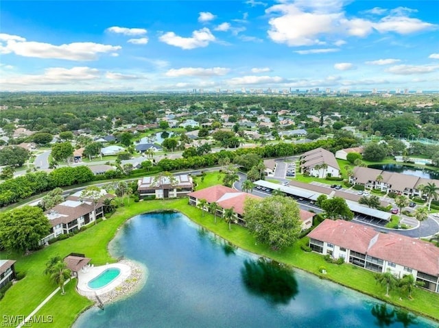 bird's eye view with a water view