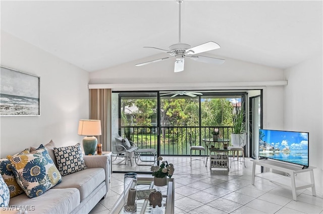 tiled living room with lofted ceiling and ceiling fan