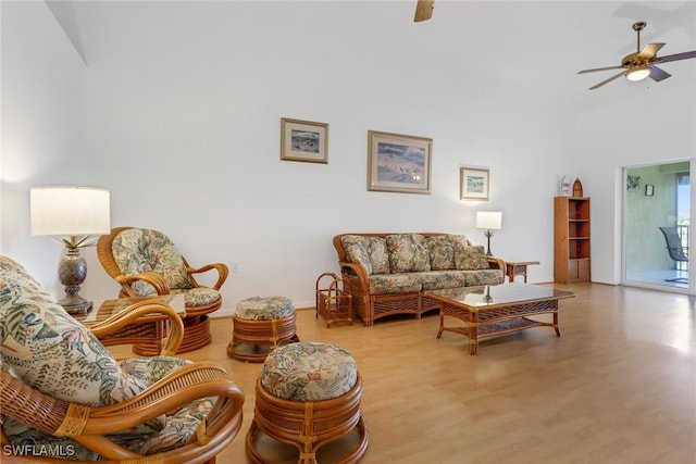 sitting room featuring light hardwood / wood-style flooring and ceiling fan