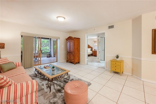 living room with light tile patterned floors