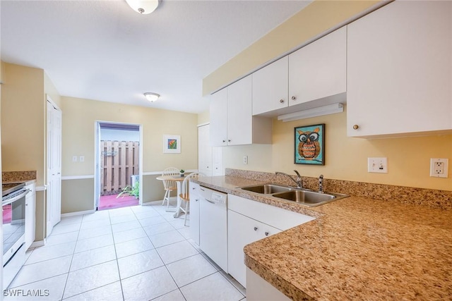 kitchen with sink, light tile patterned floors, dishwasher, white cabinetry, and stainless steel range with electric stovetop