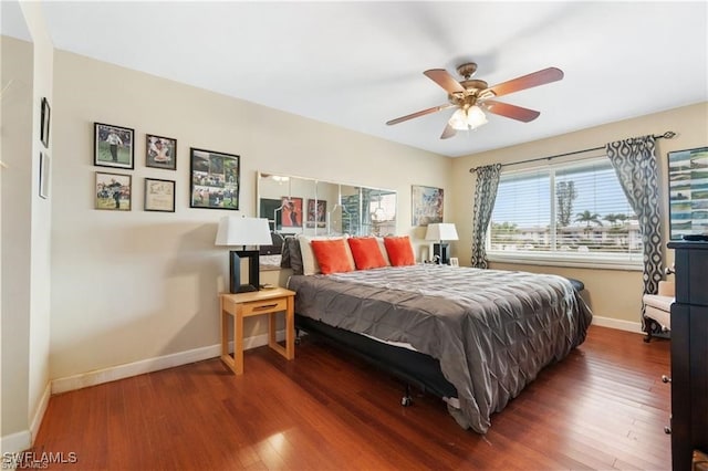 bedroom featuring ceiling fan and wood-type flooring