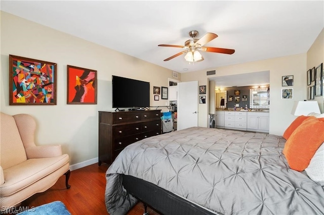 bedroom featuring wood-type flooring and ceiling fan