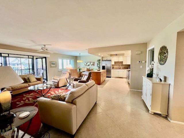 living room featuring ceiling fan