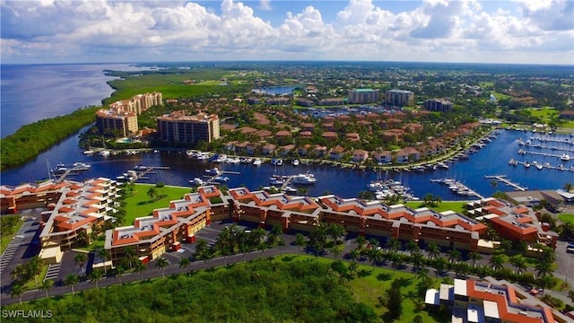 birds eye view of property featuring a water view