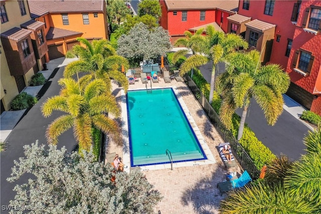 view of swimming pool with a patio area