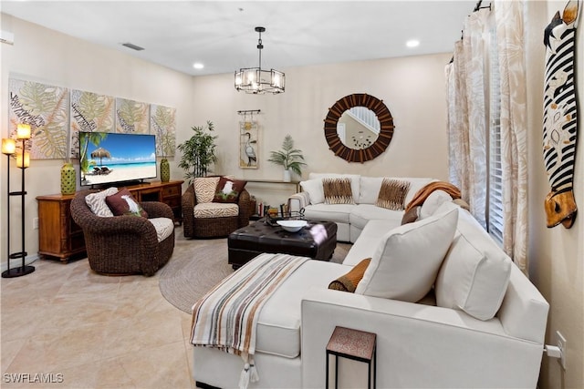 living room with a notable chandelier