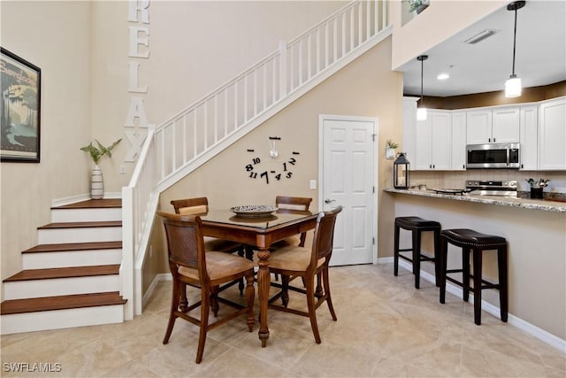 view of tiled dining area