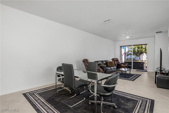 dining room featuring tile patterned flooring