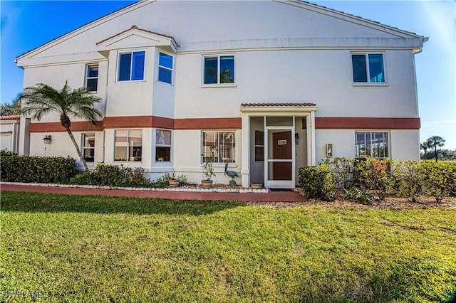 view of front of home with a front yard