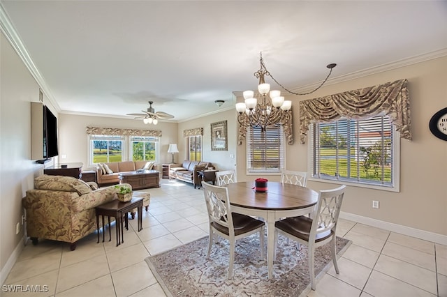 dining room featuring crown molding, ceiling fan with notable chandelier, and light tile patterned floors